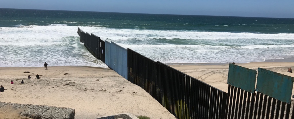 Playas-tijuana-fence-california-border-programs - Peace Works Travel